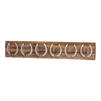 Six Nickel Horse Shoe Hooks On Wooden Board