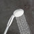 A shower head with a hose to direct the flow Grohe 26198000 1 Position