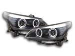 Set fari Xenon Angel Eyes LED BMW Serie 5 E60 / E61 03-04 nero per guida a destra